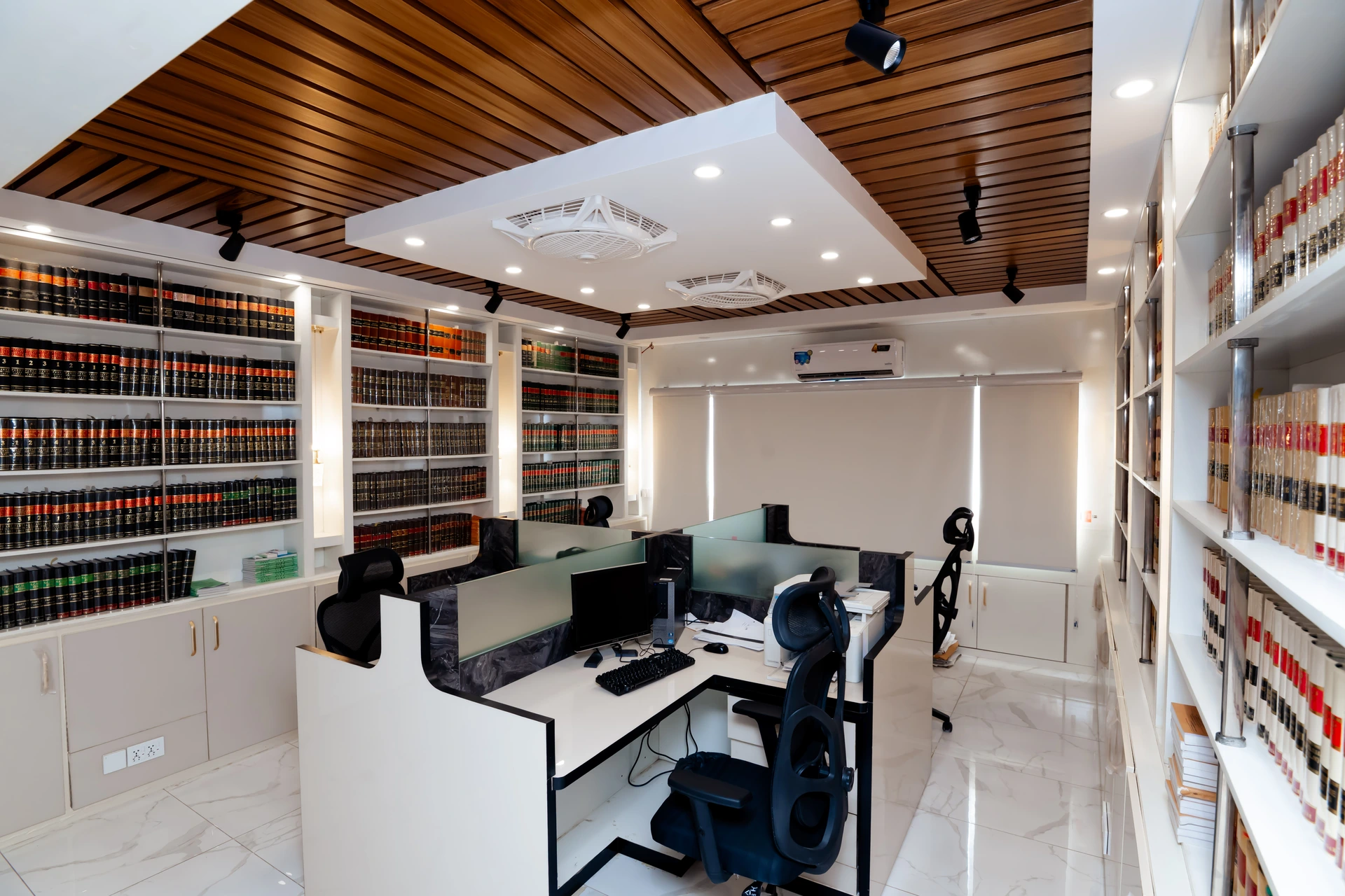 Kolachi & Co. Legal Team Workstations in Library Office